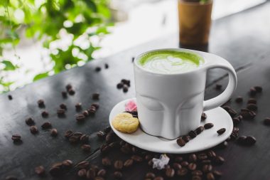 Photo of a Buddha head made into a coffee cup