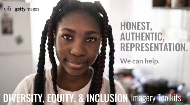 A photo of a young black person with braids wearing a white tee, looking into the camera with a warm and inquisitive look, it also has the following text overlaid on either side of the portrait: HONEST. AUTHENTIC REPRESENTATION. We can help. DIVERSITY. EOUITY. & INCLUSION Imagery Toolkits.