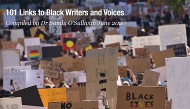 A screenshot from the 101 links to Black Writers and Voices by Dr Sandy O'Sullivan, June 2020. The image features a mass of people holding signs at a protest, the two most prominent signs that are in focus have 'BLACK LIVES MATTER' and 'No Justice'.