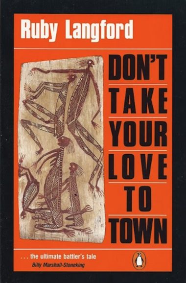 Image of Ruby Langford's book Don't Take Your Love To Town, it features intricate art of figures that's been carved onto wood, and the title of the book is in all capitals on an orange background, underneath is the blurb '... the ultimate battler's tale' by Billy Marshall-Stoneking