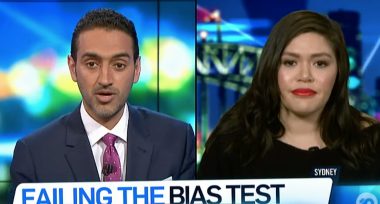 Nakkiah Lui in interview with Waleed Aly, with the text underneath in the ticker of 'failing the bias test'