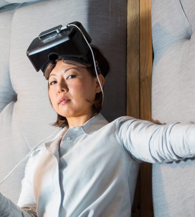 Artist Eugenie Lee wearing a VR headset