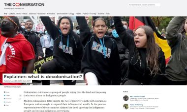 First Nations protesters with their fists in the air