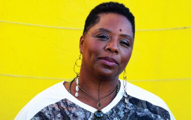 A headshot of Patrisse Cullors, a black performance artist.